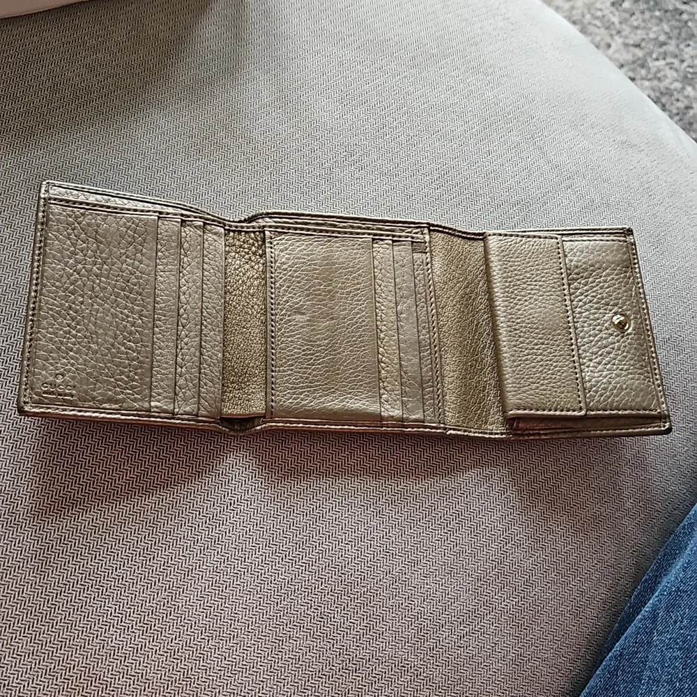 Gucci Soho tri-fold gold metallic compact wallet